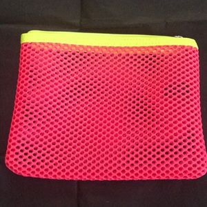 Macy’s neon net makeup bag